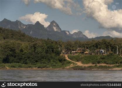River with mountain range in background, River Mekong, Oudomxay Province, Laos