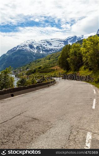 road along the shore of the fjord at the norwegian mountains, Norway