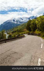 road along the shore of the fjord at the norwegian mountains, Norway
