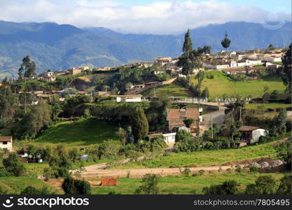 Road and buildings in the town in Ecuador