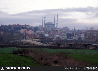 Road and minarets of old mosque in Edirne, Turkey
