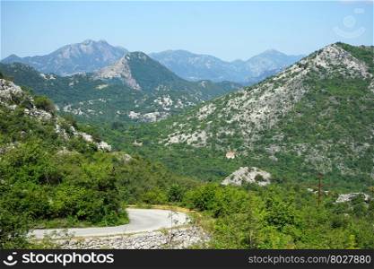 Road and mountain inear Skadarsko lake in Montenegro