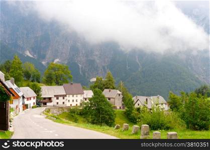 Road and village in the high mountains. Slovenia