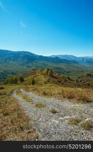 Road at the mountains. Road at the mountains, Altai