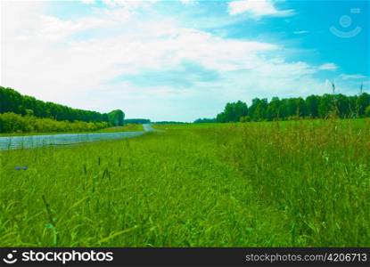 road,blue sky and green grass
