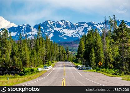 Road from Yellowstone to Grand Teton . Road from Yellowstone National Park to Grand Teton National Park, Wyoming, USA
