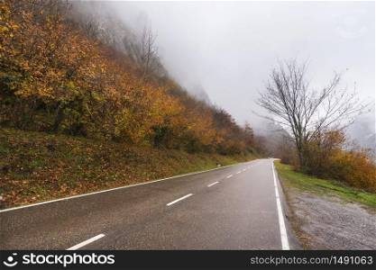 Road in autumn landscape in Somiedo natural park, Asturias, Spain.