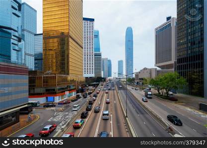 Road in Hong Kong Downtown. Financial district and business centers in smart city and technology concept. skyscraper and high-rise office buildings at sunset. International Finance Center