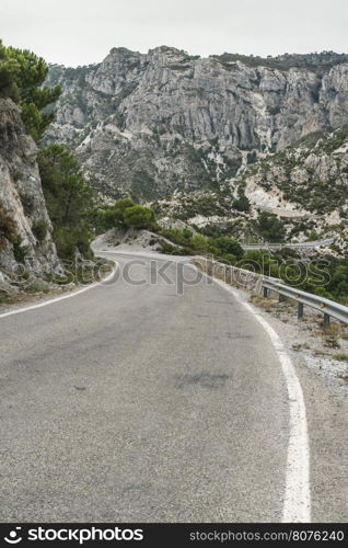 Road in the mountain. Dramatic scene