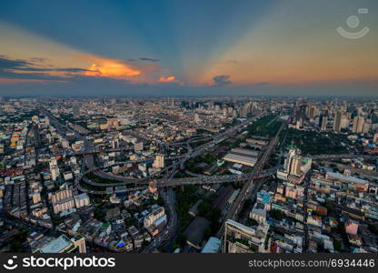 road junction and bridges, cars and traffic at sunset in Bangkok