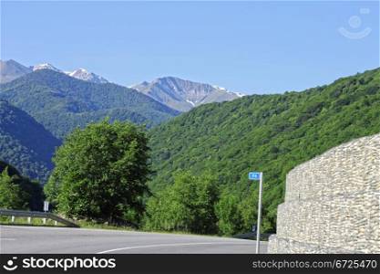 Road leading between the mountains. Caucasus travel