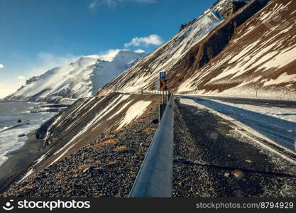 Road on hill over sea beach landscape photo. Beautiful nature scenery photography with mountains on background. Idyllic scene. High quality picture for wallpaper, travel blog, magazine, article. Road on hill over sea beach landscape photo