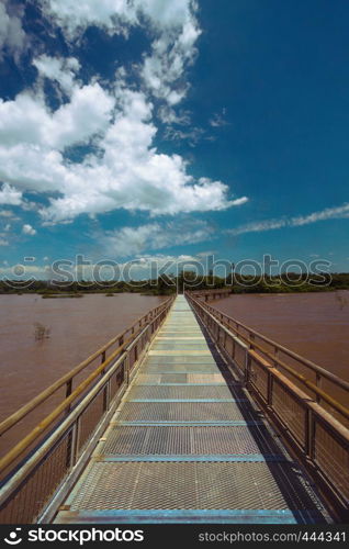 road on the worldwide known Iguassu falls at the border of Brazil and Argentina