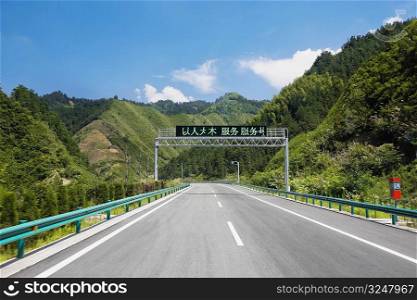 Road passing through mountains, Huangshan Mountains, Anhui Province, China