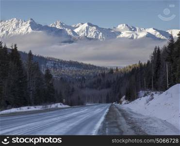 Road passing through snow covered landscape, Regional District of Fraser-Fort George, Highway 16, Yellowhead Highway, British Columbia, Canada