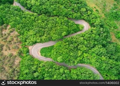 Road serpentine in mountain. Aerial nature scene.