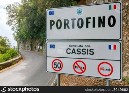 Road sign at the Portofino.. Traffic information sign about the town Portofino.