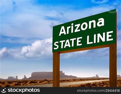 Road sign between Utah and Arizona State Line in Monument Valley