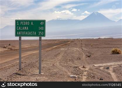 Road sign in the Atacama Desert in northern Chile, South America.