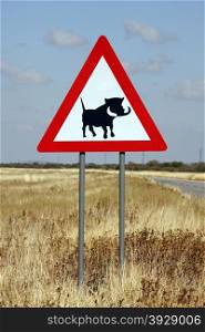 Road sign warning of warthogs in Northern Namibia