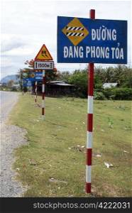 Road signs on the way throuth Vietnam