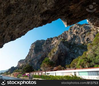 Road through a rocky tunnel, Cilento and Vallo di Diano National Park, Salerno, Italy.