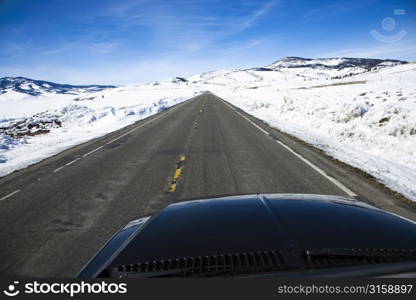 Road through snowy landscape