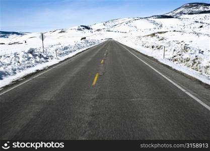 Road through snowy landscape