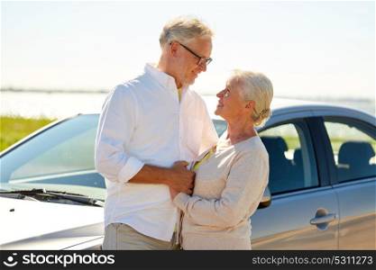 road trip, travel and old people concept - happy senior couple at car in summer. happy senior couple at car in summer