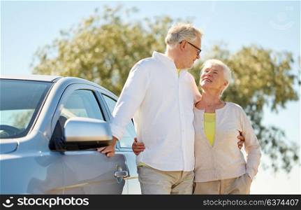 road trip, travel and old people concept - happy senior couple at car in summer. happy senior couple at car in summer