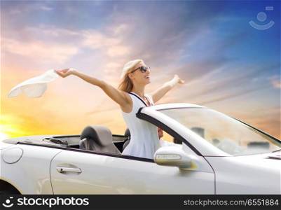 road trip, travel and people concept - happy couple driving in convertible car over sky background. happy couple driving in convertible car over sky. happy couple driving in convertible car over sky