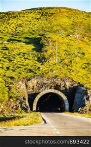 Road with tunnel across Vikafjellet between Vinje - Vik in Stolsheimen mountains area western Norway. Norwegian infrastructure. Road with tunnel in mountains Norway
