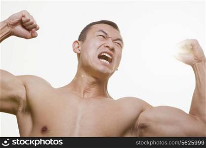 Roaring Man Flexing Muscles