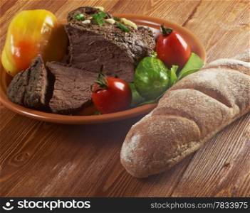 roast beef farm-style with vegetable and bread .farmhouse kitchen