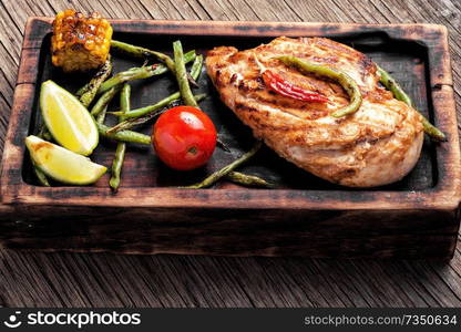 Roast chicken breast with vegetables.Grilled chicken breast. Grilled healthy chicken breasts