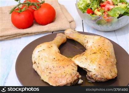 Roast chicken on the table of kitchen.