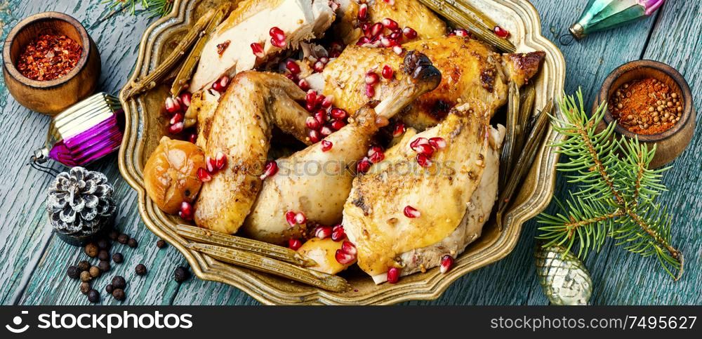 Roast chicken or turkey stuffed with apples for Christmas.Christmas food. Baked turkey or chicken
