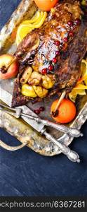 roast duck and oranges. Appetizing roasted duck with oranges on a retro tray