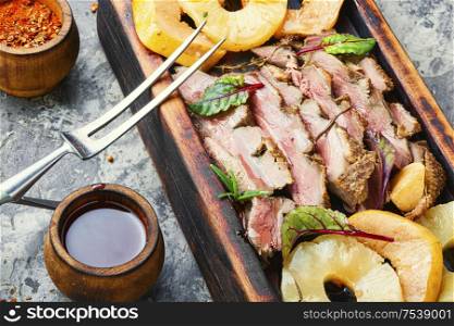 Roast duck fillet with spices.Baked duck breast with pineapple sauce. Delicious roasted duck breast
