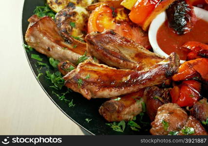 Roast meat lamb on rib with vegetables