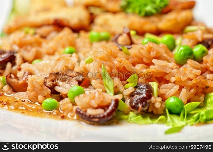 Roast pork. Roast pork and rice with vegetables and mushrooms