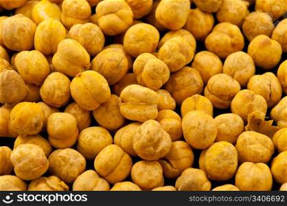 Roasted and salted chickpea closeup background