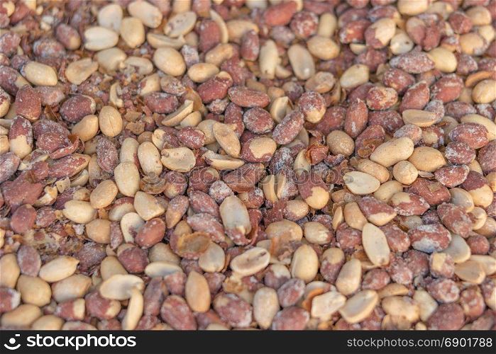 Roasted and salted red skin peanuts for sale at the fair stall, selective focus