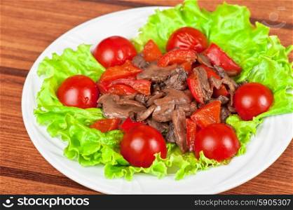 Roasted beef and mushrooms. Roasted beef and mushrooms with tomato and lettuce
