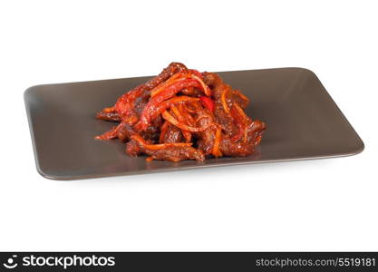 Roasted beef at sour-sweet sauce on a white background