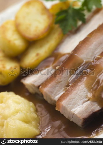 Roasted Belly Pork with Fried Potatoes and Apple Sauce