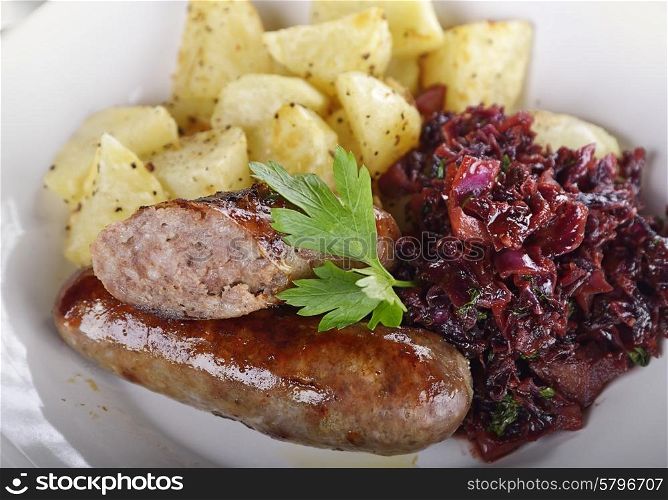 Roasted Bratwurst with Sweet and Sour Red Cabbage and Potatoes