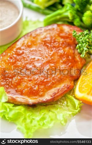 roasted chicken breast with vegetables and sauce