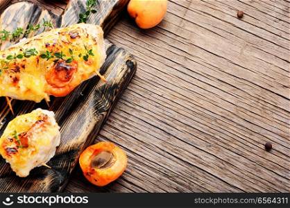 Roasted chicken breasts stuffed with apricot.Healthy food. Grilled chicken with apricot