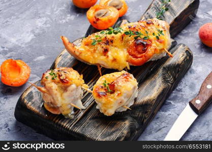 Roasted chicken breasts stuffed with ripe apricot.Healthy food. Chicken breasts cooked with apricot